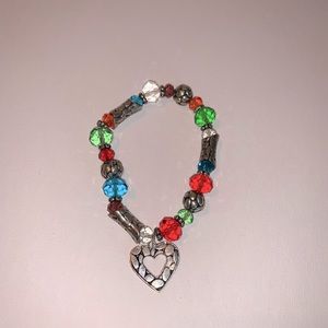 Multi colored beaded bracelet with heart charm